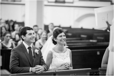 catholic wedding ceremony moment bride and groom black white